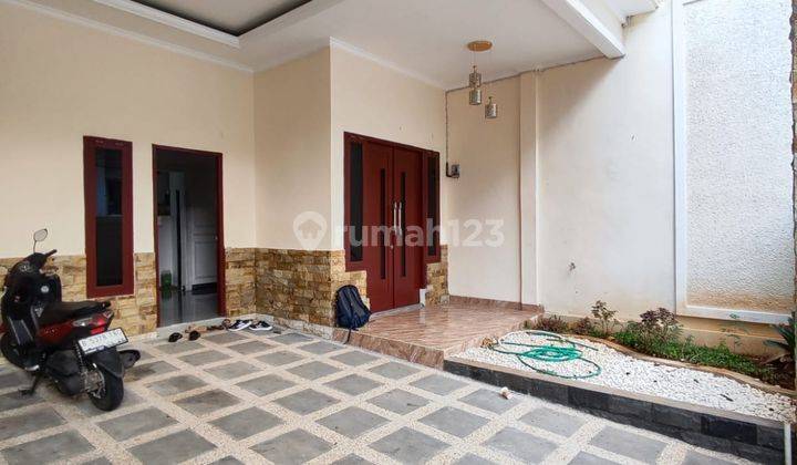 garasi/carport rumah 2 lantai cantik murah