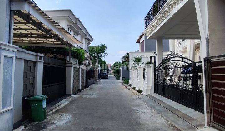 tampak depan rumah 2 lantai cantik murah