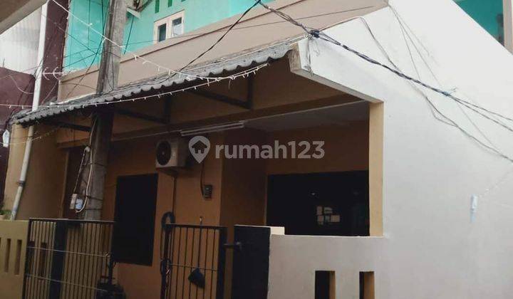 Rumah 2 Lantai luas 78 m² Di Bintara 14 zona bebas banjir 1