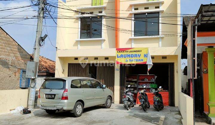 Ruko 2 Gandeng  di 
Jalan Raya Tarumajaya ,depan pintu Gerbang Perumahan Harapan Mulya Bekasi 
 1