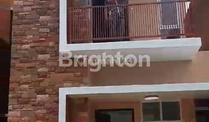 RUMAH SIAP HUNI MODEL TOWNHOUSE 2 LANTAI TENGAH KOTA 1