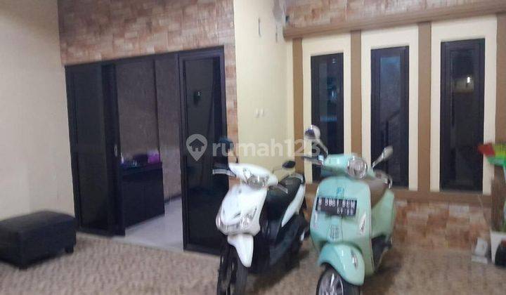 garasi/carport rumah bagus murah 2 lantai
