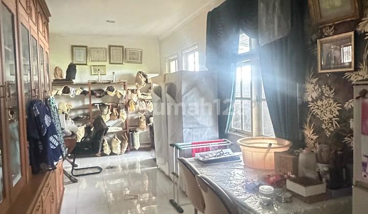 Two-Story Serene House in Modernland – Comfortable and Strategic Residence 2