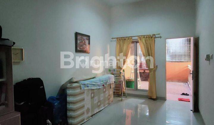 Rumah full furnished 2 lantai Hokky keren di Grand Boulevard Medan 2