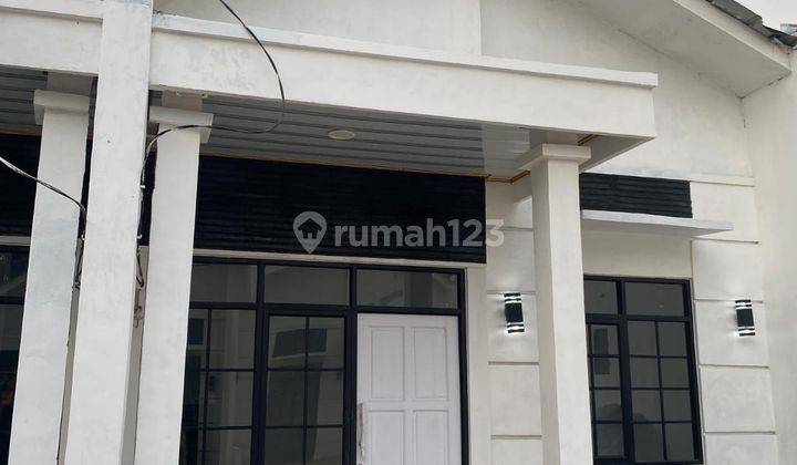 Rumah baru DP 0 free ac,khicen set,toren 500 liter,di tambun kekasi 1