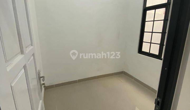 Rumah baru DP 0 free ac,khicen set,toren 500 liter,di tambun kekasi 2