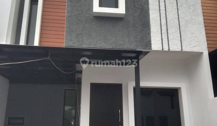 Rumah 2 lantai di jati asih fee ac dan canopy  1