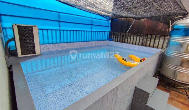 Rumah 2 lantai dicirende ciputat timur ada kolam renangnya 1