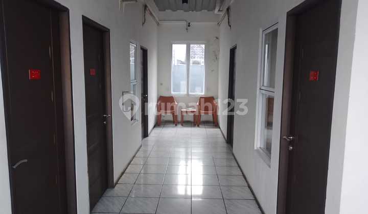 For Sale: Hostel in Taman Ratu, West Jakarta. Area 10x21m. 4 Floors with 15 Rooms