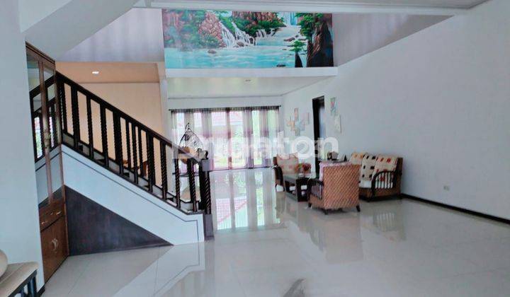 RUMAH MODERN DI ARAYA BOULEVARD JL BLIMBING INDAH MEGAH 2