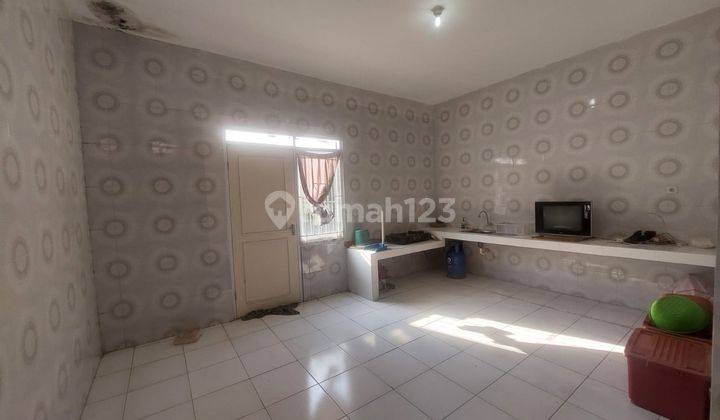Rumah Hoek Di Jalan Boulevard Dalam Cluster Citra Indah City 2