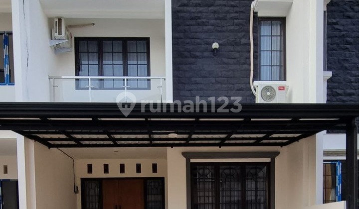 Rumah 2 Lt Gaya Bali 900 jtan dekat Jl Ry Bogor di Mekarsari Depok