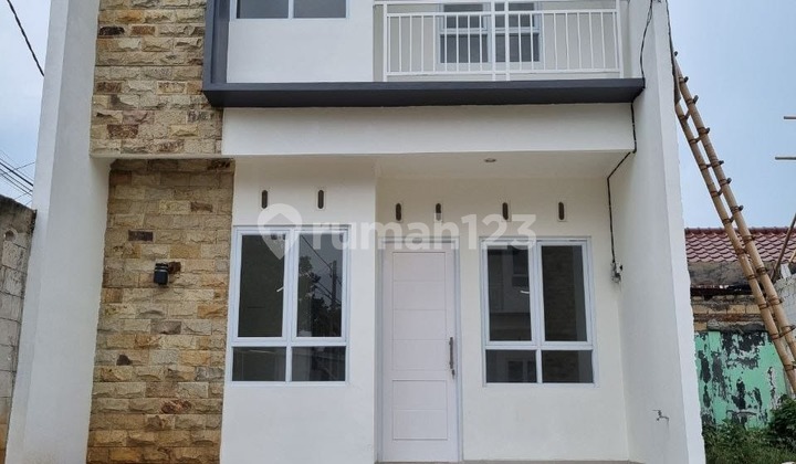 Affordable 2-story house 900 million near JlMerdeka in Sukmajaya Depok 2