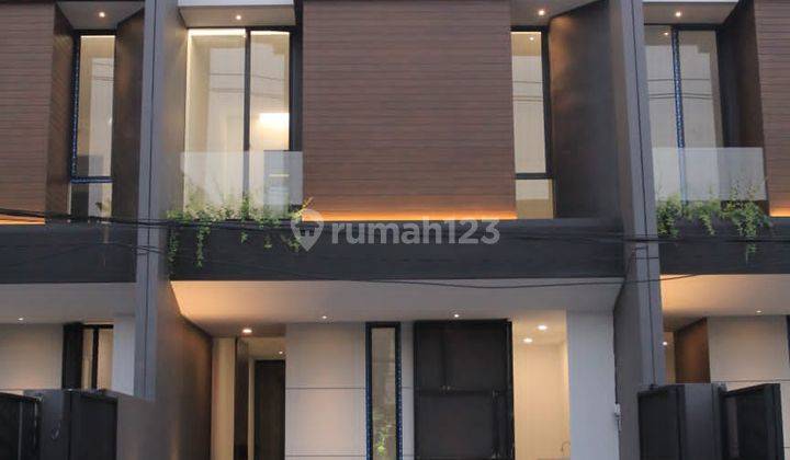 Rumah Minimalis 2 Lantai Baru SHM di Raya Kutisari Indah 1