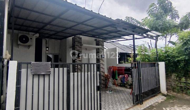 Rumah Minimalis Rapi Lokasi di Kayu Gede Graha Raya Tangerang  1