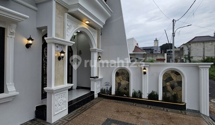 Rumah Mewah dengan Rooftop Luas Dalam Cluster 2