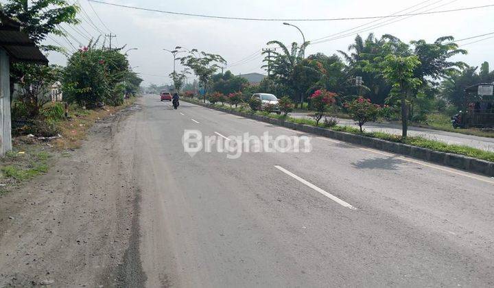 TANAH  JALAN LINTAS SUMATERA (LUBUK PAKAM) PAGAR JATI 2163 METER 2