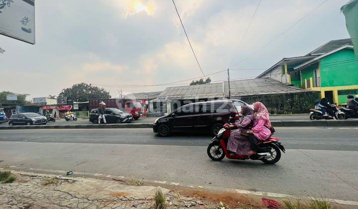 Land for 5 Million in Commercial Location on Parung Main Road with Building