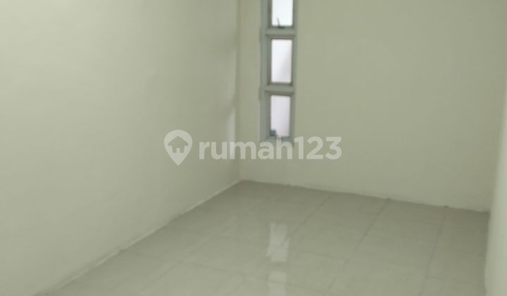 Rumah Rapi Bebas Banjir di Pondok Ungu 2 Lantai Harga Murah Negotiable