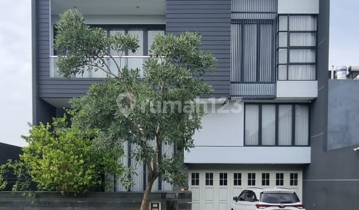 Rumah Waterfront Citraland Minimalis Dekat Graha Family