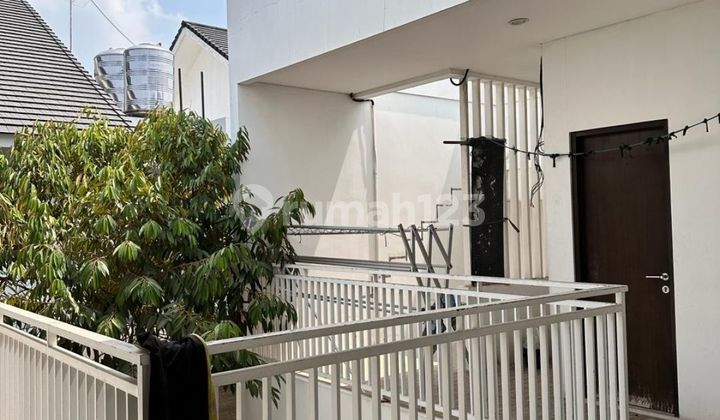 Rumah Baru Renov Bagus Terawat di Cluster Asia Tropis, Kota Harapan Indah, Bekasi 2 Lantai SHM hadap Selatan Bebas Banjir Lokasi Strategis Semi Furnish ada Gazebo Fasilitas dalam Cluster ada Sport Club #ferraang 1