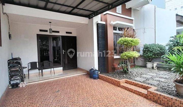 Rumah di Cluster Aralia luas tanah 112m2 bangunan 100m2 1,5 Lantai 3 kamar Bagus di Harapan indah 2 Bekasi jawa barat 1