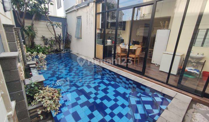 Rumah 2 lantai,minimalis Modern,siap huni,ada kolam renang,lokasi strategis dalam townhouse di pejaten barat,Jakarta selatan 1