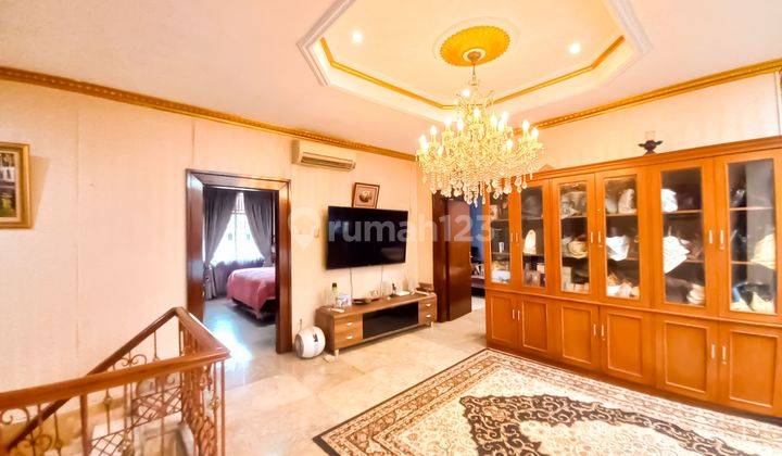 ruang tamu rumah cluster siap huni di