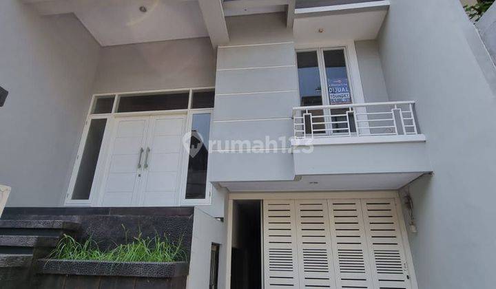 RUMAH MInimalis hadap Tenggara 1