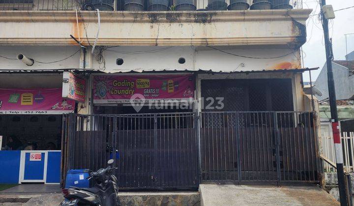 RUMAH 2.5 LANTAI DI JALAN SUMMAGUNG III KELAPA GADING DI LOKASI DAERAH RAMAI DAN BISA BUAT USAHA 1