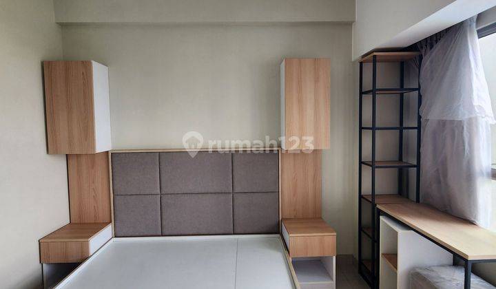 kamar tidur apartemen tipe studio di menara