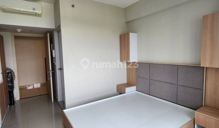 APARTEMEN TIPE STUDIO DI MENARA ELODEA, THE SPRINGLAKE VIEW, FURNISHED BAGUS, VIEW KOLAM RENANG DAN LANTAI RENDAH 2