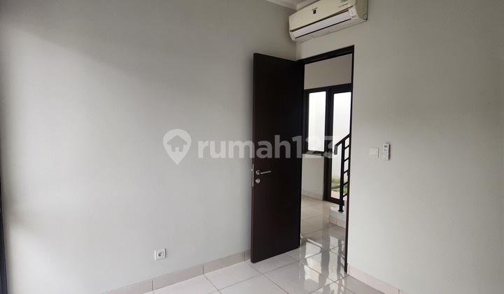 2-Story Rental House with AC, Neat, Clean, Well-Maintained, Facing the Garden of Burgundy Residence Cluster, and Close to Summarecon Mall Bekasi