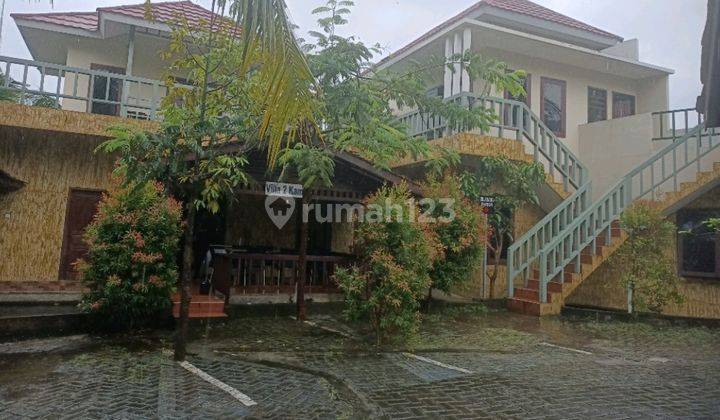 Dijual Hotel Rumah Kayu Pinggir Kali Prigen 1