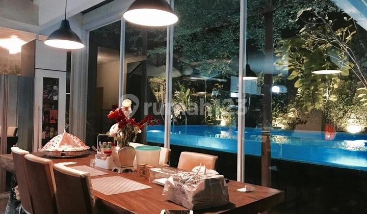 Modern house in the Unilever Pesanggrahan cluster, spacious, quiet & comfortable, with a swimming pool.