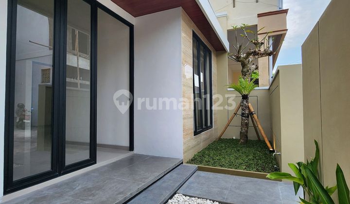 Modern Minimalist Cluster House on Purwomartani Street Type 80 2