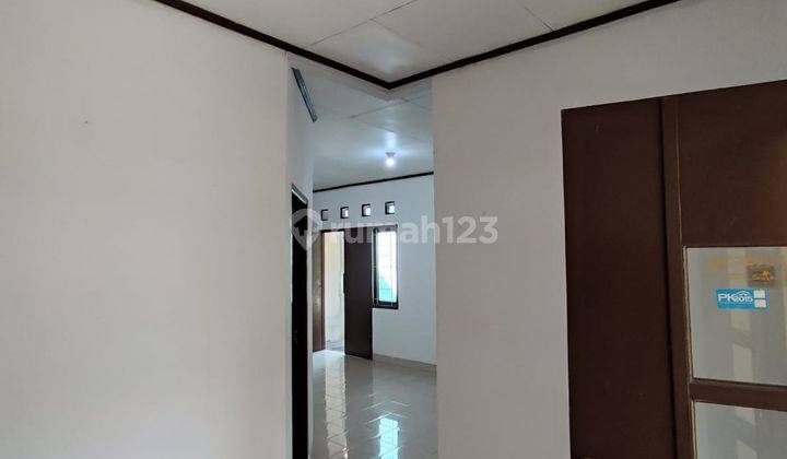 ruang tamu rumah cantik nuansa asri posisi