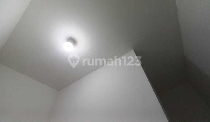 Taman Surya 2, Bebas Banjir, Rumah 2 lantai, Posisi ngantong lebar belakang 9 m depan 6m 2