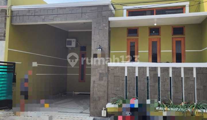 One-Story House with Minimalist Fence and One-Car Canopied Carport
