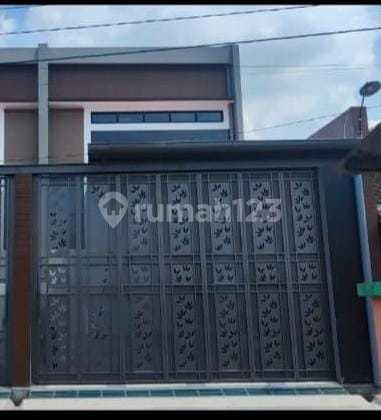 Rumah Mewah 1,5 Lantai Solo Baru Dengan Pagar Cutting Laser Minimalis Modern 2