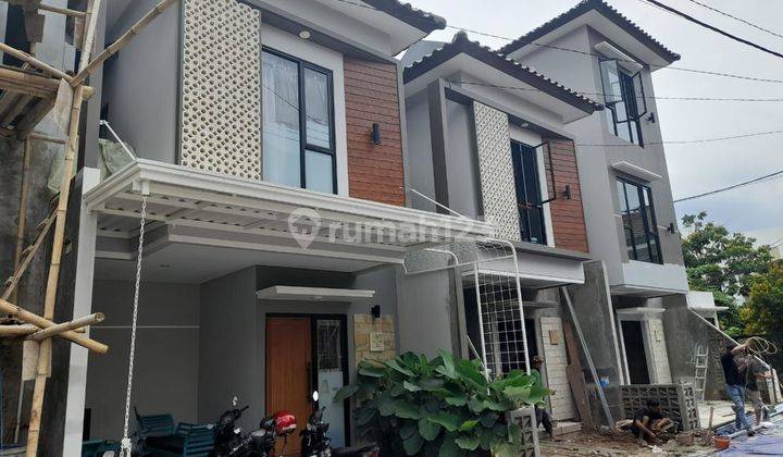 Rumah Dengan Konseptropical Modern Di Nempel Jalan  Raya 2