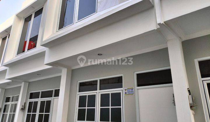 Rumah minimalis 2 lantai  1