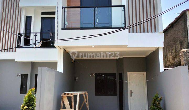 Rumah minimalis modern 2 lantai di kota Bandung  1