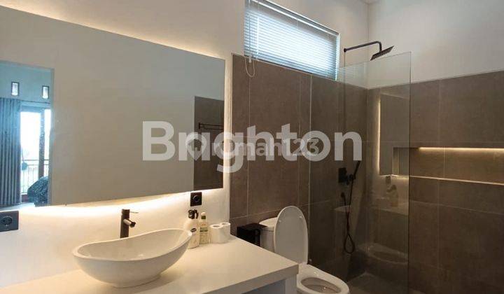 RUMAH 2 LANTAI DI BATUBULAN – FULLY FURNISHED, LOKASI STRATEGIS! 2
