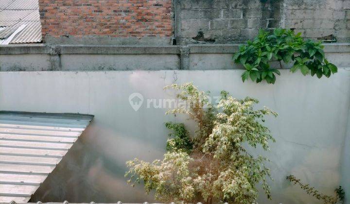 Rumah 2 Lantai Dalam Townhouse Bagus Fasilitas Lengkap 2