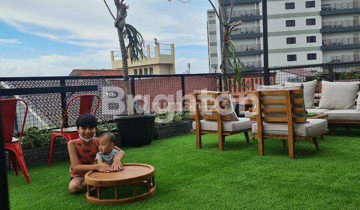 Rumah industrial dengan rooftop di Kelapa Dua Tangerang 1