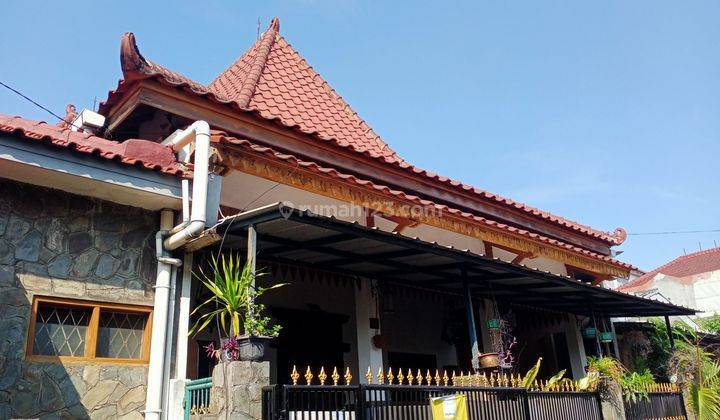 Rumah komplek BBD mekar sari depok ber etnik jawa beratap joglo  1