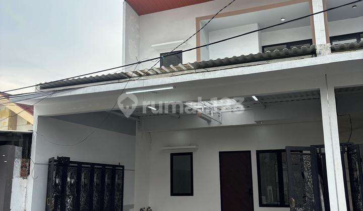 New Darmo Permai house near HR Mohammad and the Mayjen Sungkono satellite toll road, Surabaya Barat. 2