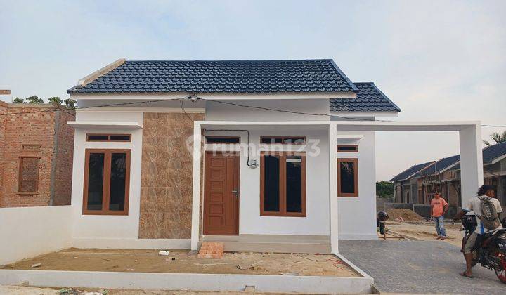 DI JUAL RUMAH CLUSTER DI DEKAT KAMPUS UIR DP 10 JUTA SAMPAI AKAD  1