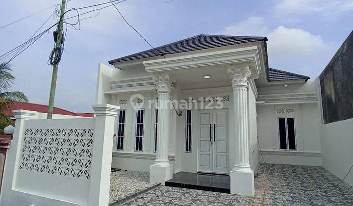 di jual rumah berpagar cantik di cipta karya panam dp 30 juta sampai akad  2